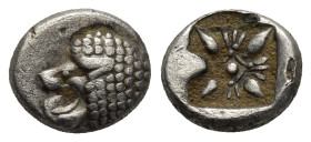 IONIA. Miletos. (Late 6th-early 5th centuries BC). AR Obol (10mm, 0,9 g) Obv: Forepart of lion right, head left. Rev: Stellate floral design, with M r...
