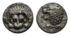 SATRAPS OF CARIA. Hekatomnos (392-376 BC). Hemiobol. (0.52 Gr. 7mm.)
 Forepart of facing lion.
Rev. Head of roaring lion left.
