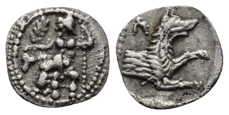 LYCAONIA. Laranda. Circa 324/3 BC. Obol (0.70 Gr. 12mm.). 
Baal seated left, hol...