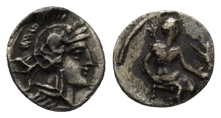 CILICIA. Uncertain. Obol (4th century BC). (0.72 Gr. 9mm.)
 Helmeted head of Ath...