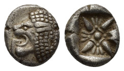 Ionia. Miletos circa 600-500 BC. Obol AR (0.99 Gr. 9mm.). 
Forepart of lion right, head reverted 
Rev. Stellate pattern within incuse square.