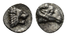 Caria. Uncertain mint circa 450-400 BC. Tetartemorion AR (0.25 Gr. 6mm.) 
 Forepart of a roaring lion right within incuse square.
Rev. Ram's head righ...