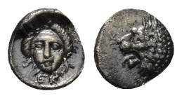 SATRAPS OF CARIA. Hekatomnos, circa 392/1-377/6 BC. Tetartemorion (0.21 Gr. 6mm.) 
 Head of Apollo (?) facing three-quarters to left.
Rev. Forepart of...