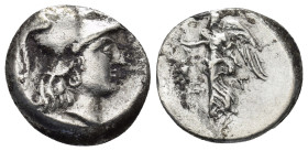 PAMPHYLIA, Side. Circa 183-175 BC. AR Drachm (3.84 Gr. 17mm).
 Head of Athena right, wearing crested Corinthian helmet 
Rev. Nike advancing left, hold...
