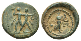 PISIDIA. Etenna. Ae (14mm, 2.6 g) (1st century BC). Obv: Two men standing side by side; the left brandishing double-axe, the right sickle. Rev: ET - E...