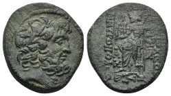 Syria, Antiochia .54-53 BC. AE (6.8 Gr. 20mm.), 
Laureate head of Zeus right. 
Rev. Zeus seated left, holding Nike and sceptre.