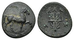 CARIA. Mylasa. Ae (3rd-2nd centuries BC). (1.3 Gr. 14mm.)
 Horse prancing right.
 Rev. Decorated trident.
