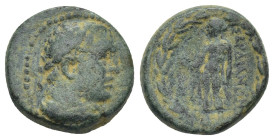 Lydia, Sardes, c. 133 BC-AD 14. Æ (15mm, 5.3 g). Laureate head of youthful Herakles r., lion skin tied around neck. R/ Apollo standing l., holding cro...