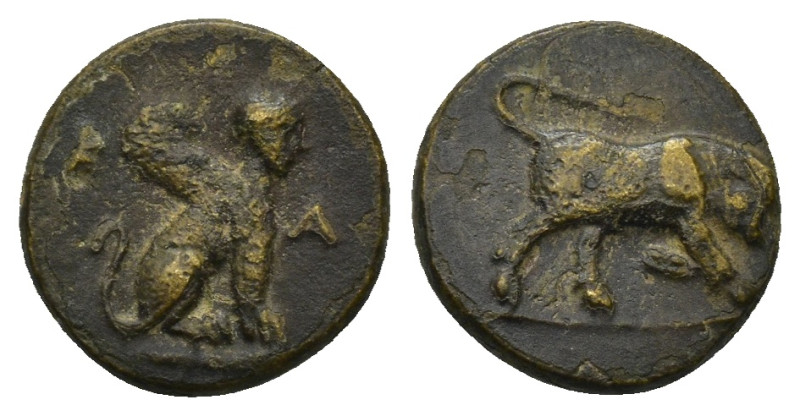 Caria. Kaunos circa 300-250 BC. Bronze AE (1.6 Gr. 12mm.). 
K-A, sphinx seated r...