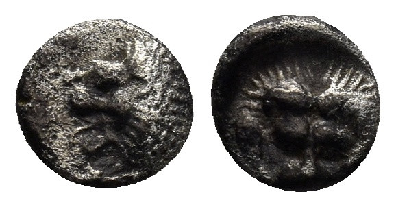 CARIA. Mylasa. (Circa 420-390 BC). AR Hemiobol. (0.43 Gr. 7mm.)
Forepart of lion...