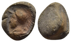 Library terracotta seal. Helmeted bust left. 15mm, 2.0 gr.