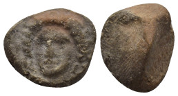 Library terracotta seal. Head facing. 16mm, 1.68 gr.