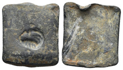 Lead square weight. Square in form, one face stamped. 20mm, 6.4 gr.
