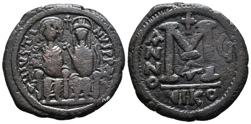 Byzantine Coins AE, 7th - 13th Centuries. 
Reference:

Condition: Very Fine
...