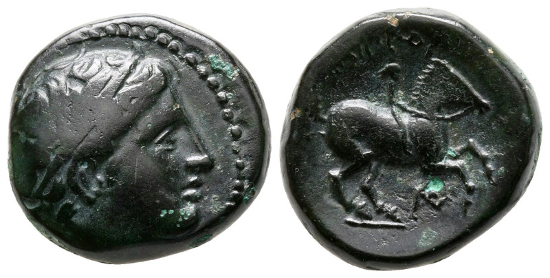 Kings of Macedon. Uncertain mint. Philip II of Macedon 359-336 BC. 
Bronze Æ
...