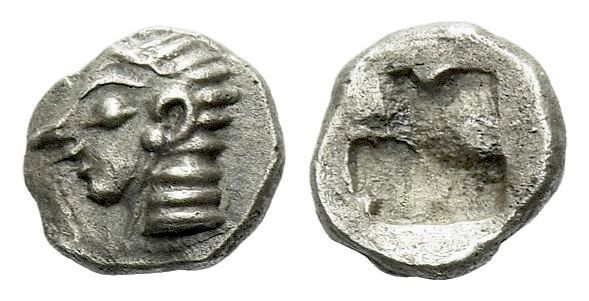 Ionia, Colophon Tetartemorion circa 530-500, AR 6.00 mm., 0.22 g.
Archaic male ...