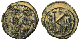 Justin II, with Sophia, 565-578. Half Follis (bronze, 7.58 g, 24 mm), Constantinople. Justin, holding globus cruciger, and Sophia, holding cruciform s...