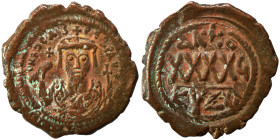 Phocas 602-610. Follis (bronze, 11.20 g, 31 mm). Cyzicus. d N FOCAS PERP AVG Crowned bust facing, wearing consular robes, holding mappa and cross; sma...