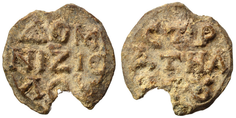 Byzantine lead seal, uncertain (lead, 6.10 g, 20 mm). Inscription in three lines...