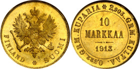 Finlandia. 1913. Nicolás II. S. 10 marcos. (Fr. 3) (KM. 9.2). En cápsula de la NGC como MS65, nº 154097-066. Bella. Rara. AU. S/C.