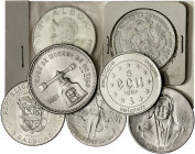 Lote de 7 monedas en plata de diversos países. A examinar. 151,67 g. BC/S/C.