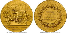 Republic gold "Caen Fire Department" Medal 1903-Dated MS63 NGC, 50mm. 94.77gm. By A. Dubois. Three firefighters directing fire engine toward burning b...