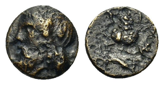 Aeolis, Temnos, c. 300-200 BC. Æ (10mm, 1g). Bearded head of Dionysos l., wreath...