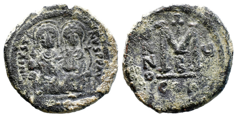 Justinian I, 527-565 AD. AE Half Follis 12,70 Gr. 29,02mm
Helmeted and cuirassed...