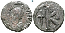 Justinian I. AD 527-565. Contemporary imitation (?). Constantinople. Half follis Æ