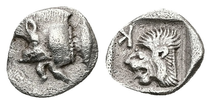 Mysia, Kyzikos. AR Obol, 0.78 g 11.09 mm. Circa 450-400 BC.
Obv: Forepart of boa...