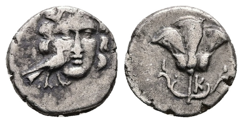 Caria, Mylasa. AR Drachm, 2.21 g 13.96 mm. Circa 170-130 BC. 
Obv: Facing head o...