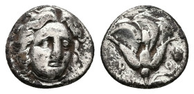 Caria, Rhodos. AR Hemidrachm, 1.59 g 12.18 mm. Circa 408/7-390 BC.
Obv: Head of Helios facing, turned slightly to the right.
Rev: P-O, Rose within an ...