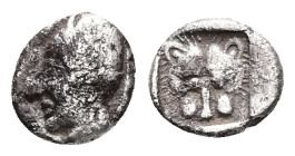 Caria, Uncertain. AR Obol, 0.58 g 8.68 mm. Mid 5th century BC. Aeginetan standard. 
Obv: Head of female left, wearing sakkos 
Rev: Facing head of lion...