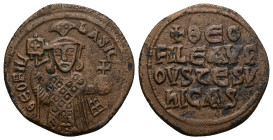 Theophilus, AD 829-842. AE, Follis. 8.26 g. 27.37 mm. Constantinople.
Obv: ΘEOFIL-bASIL. Crowned, three-quarter length figure of Theophilus facing, pe...