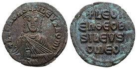 Leo VI the Wise, AD 886-912. AE, Follis. 6.12 g. 26.13 mm. Constantinople.
Obv: + LЄOҺЬAS-ILЄVSROM. Frontal bust of Leo VI with short beard wearing ch...