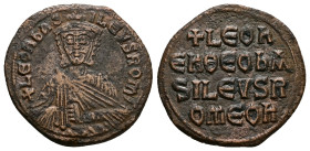 Leo VI the Wise, AD 886-912. AE, Follis. 8.50 g. 26.56 mm. Constantinople.
Obv: + LЄOҺЬAS-ILЄVSROM. Frontal bust of Leo VI with short beard wearing ch...