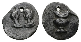 AE Roman token. Time of Gordian III (AD 238–244)
Obv: Confronted busts of Gordian III, r., and Tranquillina, draped, l.
Rev: Vase.
Weight: 1.92 g.
Dia...