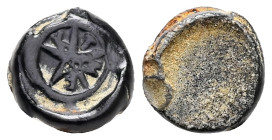 Romano-Byzantine glass weight. 20 siliquae (AD 5th–7th centuries)
Obv: Five pointed star with letters (Κ, Τ, Μ, Ε) between rays.
Weight: 3.84 g.
Diame...