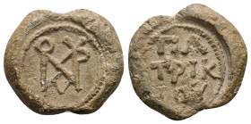 PB Byzantine seal of Marianos (or Marinos), patrikios (AD 6th century)
Obv: Block monogram. Reading: Μαριανοῦ (or Μαρίνου). Wreath border.
Rev: Inscri...