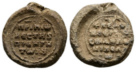 PB Byzantine seal of Nikolaos, patrikios vestes and prohegetor (AD 11th century, second half)
Obv: Inscription of five lines beginning with a cross: +...