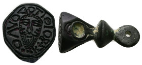 AE Byzantine anonymous stamp seal (AD 7th-9th centuries)
Conical-shaped bronze stamp seal with loop at top for suspension; circular Greek inscription...
