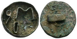 AE Early Byzantine bronze bread-stamp (AD 5th–7th centuries)
Bronze bread-stamp with four letters in high relief: α, μ, ο, ρ. Possible reading: Μα(ύ)ρ...