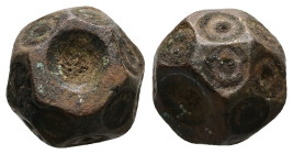 AE Islamic (Seljuk or Beyliks). Five-dirham weight (AD 11th–13th centuries)
Polyhedron; each facet contains a bird’s eye motif but the top and bottom ...