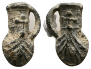 PB Byzantine pilgrim’s ampulla (AD 11th–13th centuries) 
A lead, one handled pilgrim’s ampulla decorated with ‘scallop shell’ moulding on both sides. ...