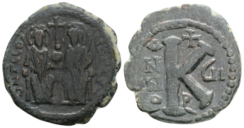 Byzantine
Justin II Æ Half Follis. Constantinopolis, Year 7 = AD 571-572. 6,5 g....