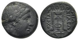 SELEUKID KINGDOM. Antiochos II Theos (261–246 BC). AE.(5.6 Gr. 15mm.) Sardeis. 
Laureate head of Apollo right.
 Rev. BAΣΙΛΕΩΣ ANTIOXOY. Tripod....