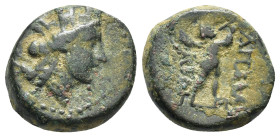 Phrygia, Apameia. Civic issue. 133-48 B.C. AE (17mm, 5.38 g) Bust of Tyche right/ Marsyas striding to right playing double-flutes.