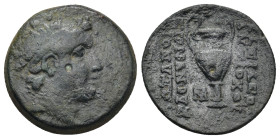 SELEUKID KINGS of SYRIA. Antiochos VI. 144-142 BC. Æ (20mm, 6.4 g). Antioch mint. Radiate and diademed head right / Kantharos; monogram to left, small...