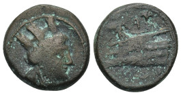 Phoenicia. Arados circa 220 BC. Bronze Æ (18mm, 6.4 g). Turreted head of Tyche right / Monogram above, prow left, Phoenician date below.