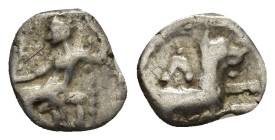 LYCAONIA, Laranda. Circa 324/3 BC. AR Obol (9mm, 0.49 g). Baaltars seated left, holding grain ear, grape bunch, and scepter / Forepart of wolf right; ...